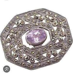 Elegant Silver and Amethyst Brooch